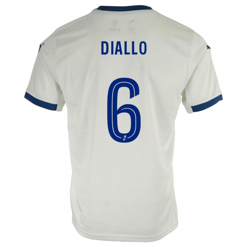 נשים Amadou Diallo #6 לבן כחול הרחק ג'רזי 2025/26 חולצה קצרה