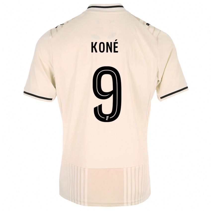 נשים Yacouba Koné #9 תחרה ישנה שחור לבן עתיק הרחק ג'רזי 2026/27 חולצה קצרה