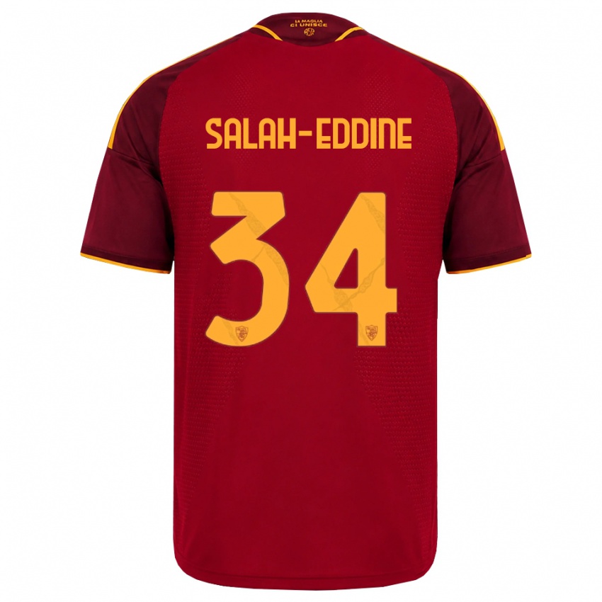 נשים Anass Salah-Eddine #34 אדום זהוב צהוב ג'רזי ביתית 2026/27 חולצה קצרה