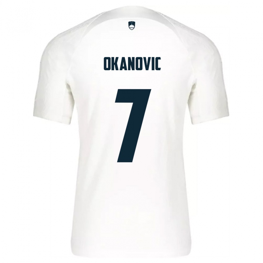 נשים סלובניה Deen Okanovic #7 לבן כחול ג'רזי ביתית 26-28 חולצה קצרה